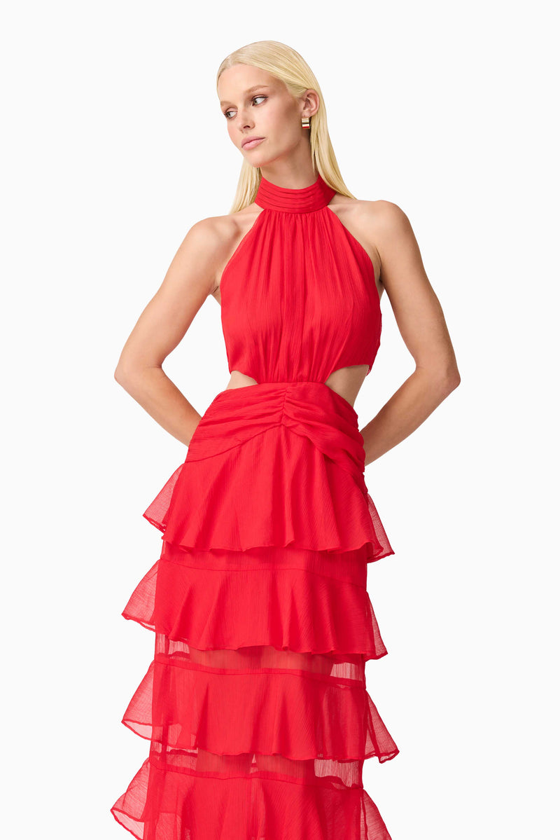 Blonde model wearing Lilja Halter Neck Maxi Dress in Red close up looking away shot
