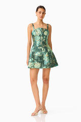 Meliora Tulip Mini Dress in Green Floral with floral jacquard posed shot