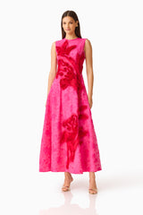 Florentia Textured Jacquard Maxi Dress in Pink and Red with fit & flare silhouette & round neckline posed shot