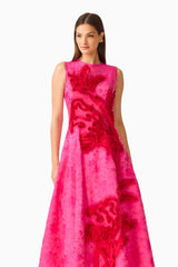 Florentia Textured Jacquard Maxi Dress in Pink and Red with fit & flare silhouette & round neckline close up looking away shot