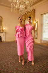 Model wearing the Orelia Pleated Midi Dress in Candy Pink to spring racing