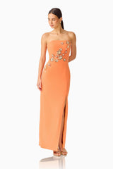 Solae Column Gown in Orange with floral appliques and front slit posed shot