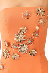 Solae Column Gown in Orange with floral appliques and front slit detail shot