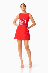 Fleurisca Embroidered Mini Dress in Scarlet Red with boat neckline &  fit and flare silhouette posed shot