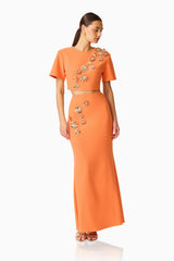 Solae Floral Top & Skirt Set in Orange with metal flower trim posed shot