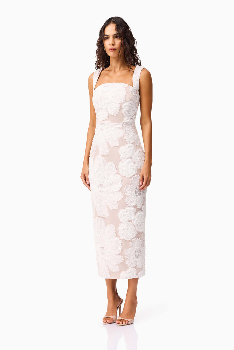 Brunette model wearing the Roxana Midi Dress in White side shot 