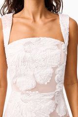 Brunette model wearing the Roxana Midi Dress in White detail shot 