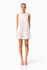 Brunette model wearing the Roxana Shift Mini Dress in White front shot