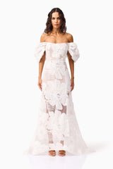 Brunette model wearing the Roxana Off The Shoulder Gown in White front shot 