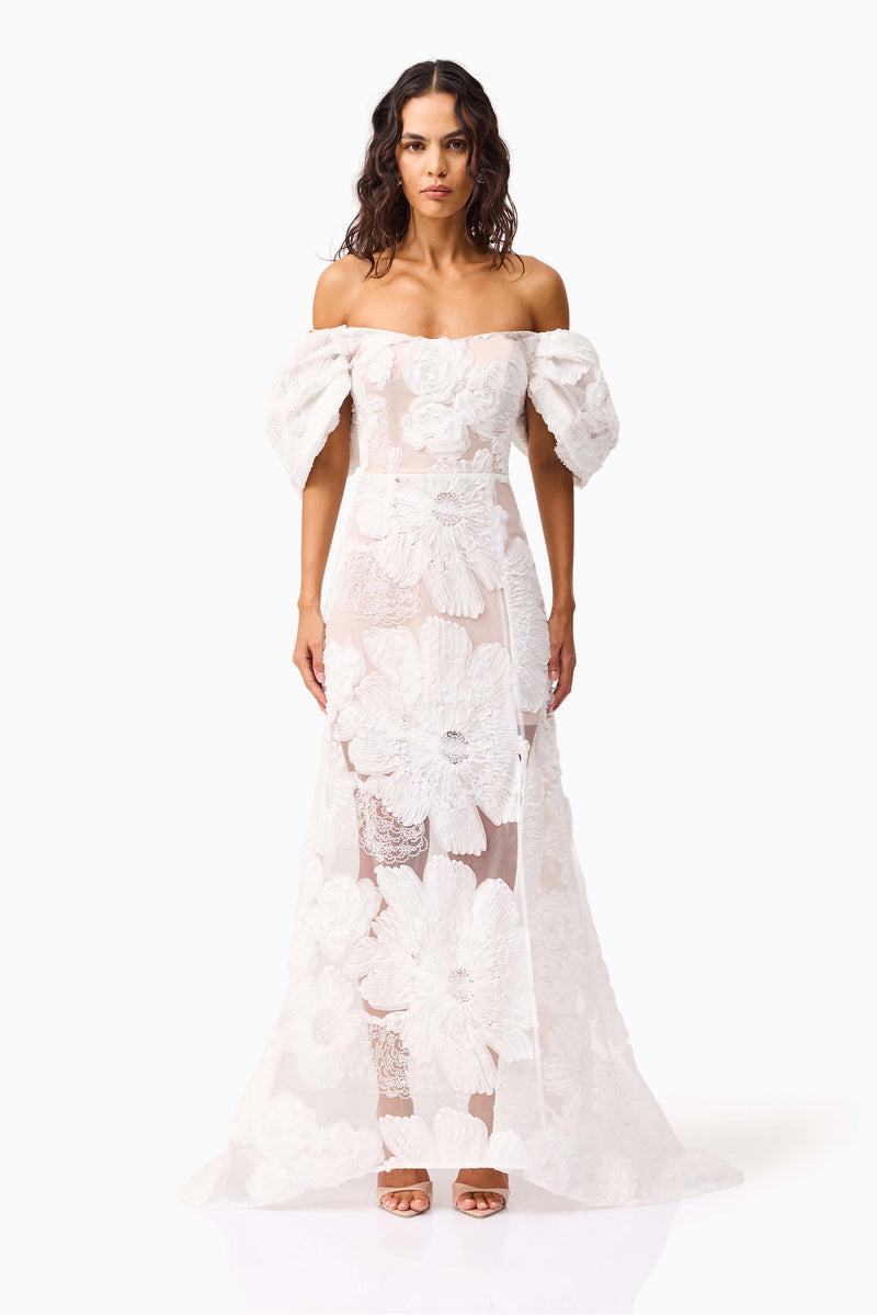 Brunette model wearing the Roxana Off The Shoulder Gown in White front shot 