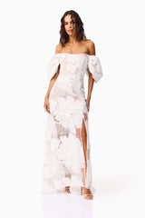 Brunette model wearing the Roxana Off The Shoulder Gown in White posed shot 