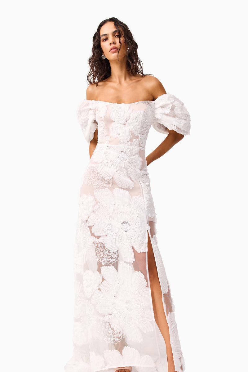 Brunette model wearing the Roxana Off The Shoulder Gown in White close up shot 