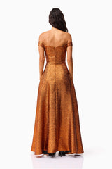 Brunette model wearing the Sapphira Off The Shoulder Gown in Orange back shot 