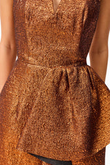Brunette model wearing the Sapphira Strapless Mini Dress in Orange detail shot