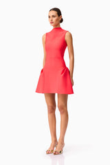 Brunette model wearing the Jesselle Mini Dress in Red side shot 