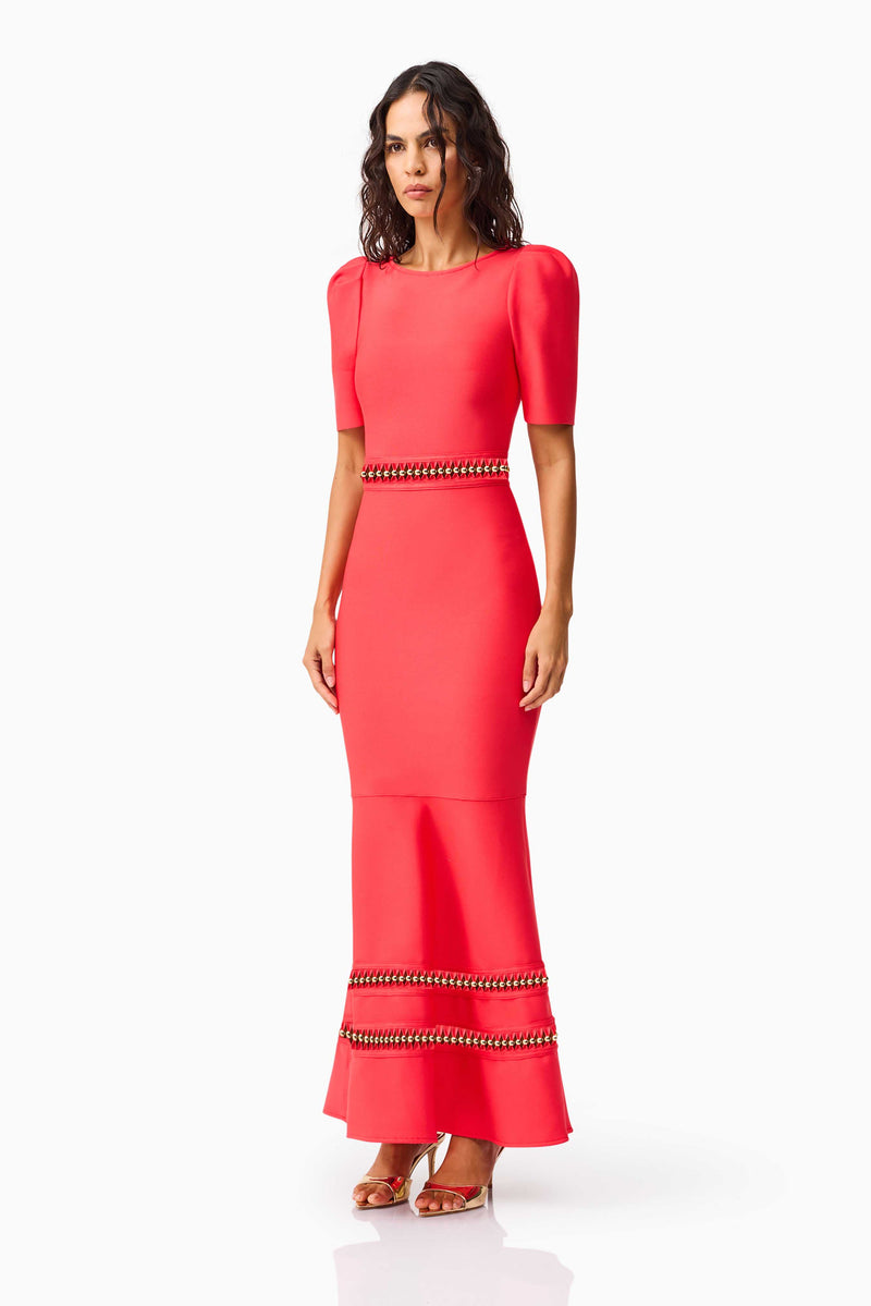 Brunette model wearing the Jesselle Short Sleeve Gown in Red side shot 