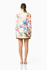 Glinda Blazer Dress in Multi Floral With long sleeves & collar V neckline back shot styled with pants 