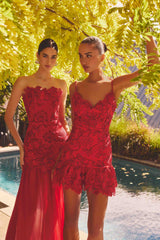 Model is wearing the Petaluxe Lace Gown in Red to a race day