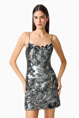 Titania Party Mini Dress in Deep Silver with 3d flower trim close up posed shot