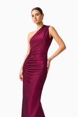 Model wearing Genovia One Shoulder Maxi Dress in Garnet Pink with asymmetrical neckline & column silhouette close up hand on hip shot
