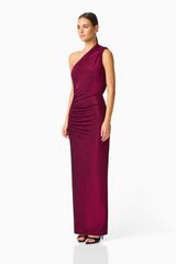 Model wearing Genovia One Shoulder Maxi Dress in Garnet Pink with asymmetrical neckline & column silhouette side shot