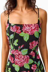 Brunette mode wearing the Lyra Sequin Gown in Pink & Green Floral detail shot 