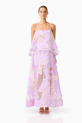 Brunette model wearing the Elysia Tiered Gown in Purple Floral front shot