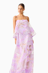 Brunette model wearing the Elysia Tiered Gown in Purple Floral close up shot
