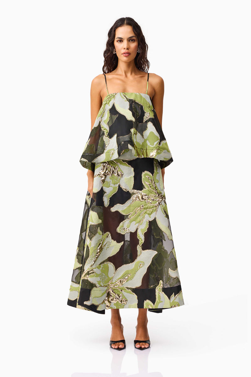 Brunette model wearing the Elysia Tiered Gown in Black & Green Floral front shot