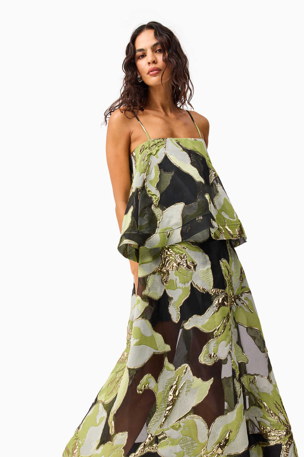 Brunette model wearing the Elysia Tiered Gown in Black & Green Floral close up shot