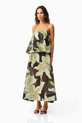 Brunette model wearing the Elysia Tiered Gown in Black & Green Floral side shot
