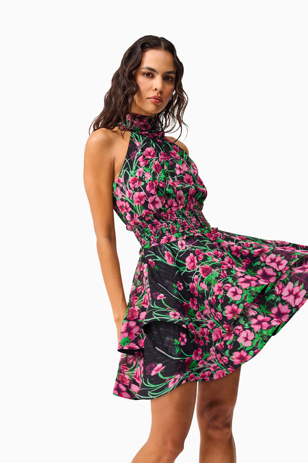 Brunette Model wearing the Estelle Halter Mini Dress in Black & Pink Floral close up shot