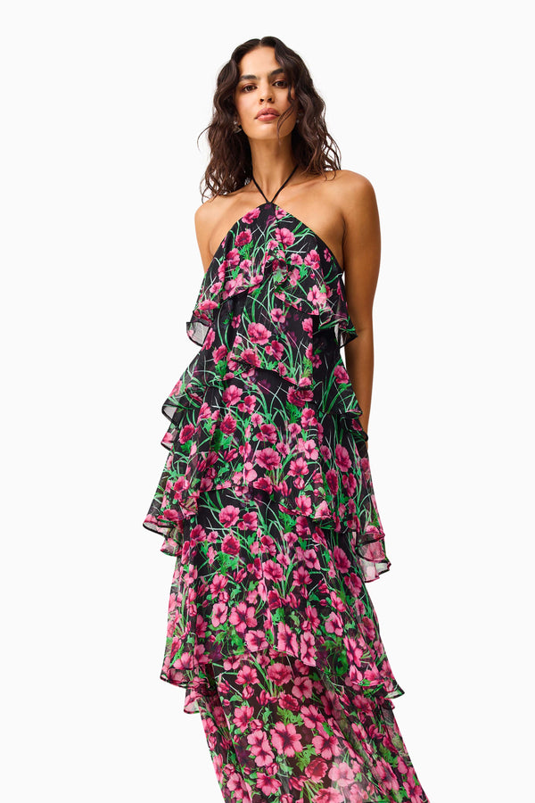 Brunette model wearing the Estelle Halter Gown in Black & Pink Floral close up shot