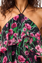 Brunette model wearing the Estelle Halter Gown in Black & Pink Floral detail shot