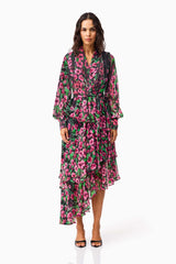 Brunette model wearing the Estelle Halter Mini Dress in Black & Pink Floral front shot