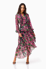 Brunette model wearing the Estelle Halter Mini Dress in Black & Pink Floral posed shot 2