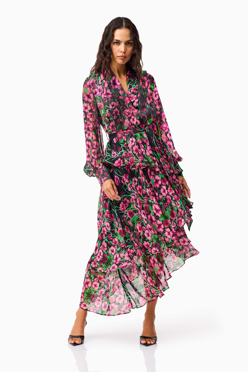 Brunette model wearing the Estelle Halter Mini Dress in Black & Pink Floral posed shot 2