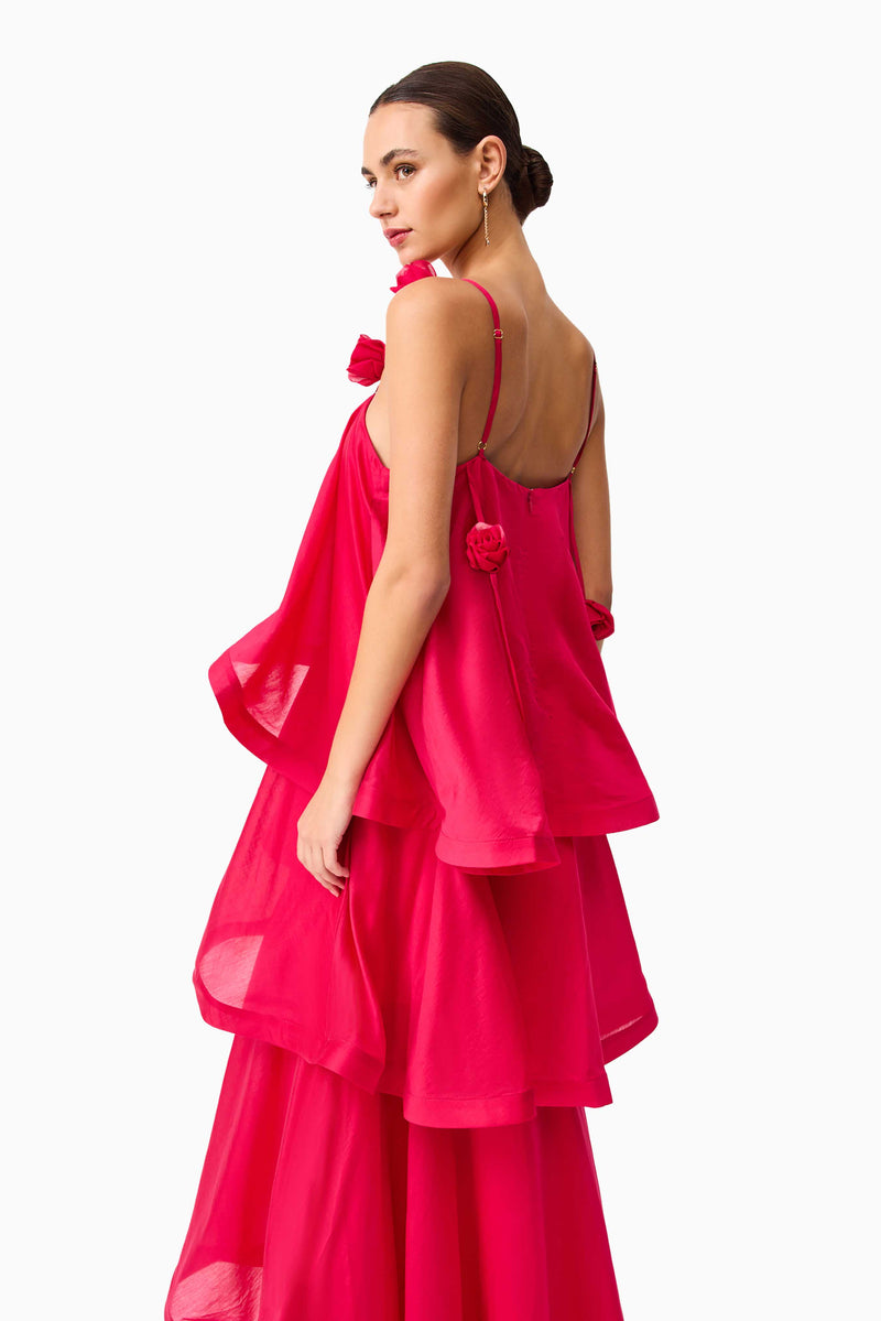 Brunette model wearing the Thalia Tiered Gown in Pink close up side shot