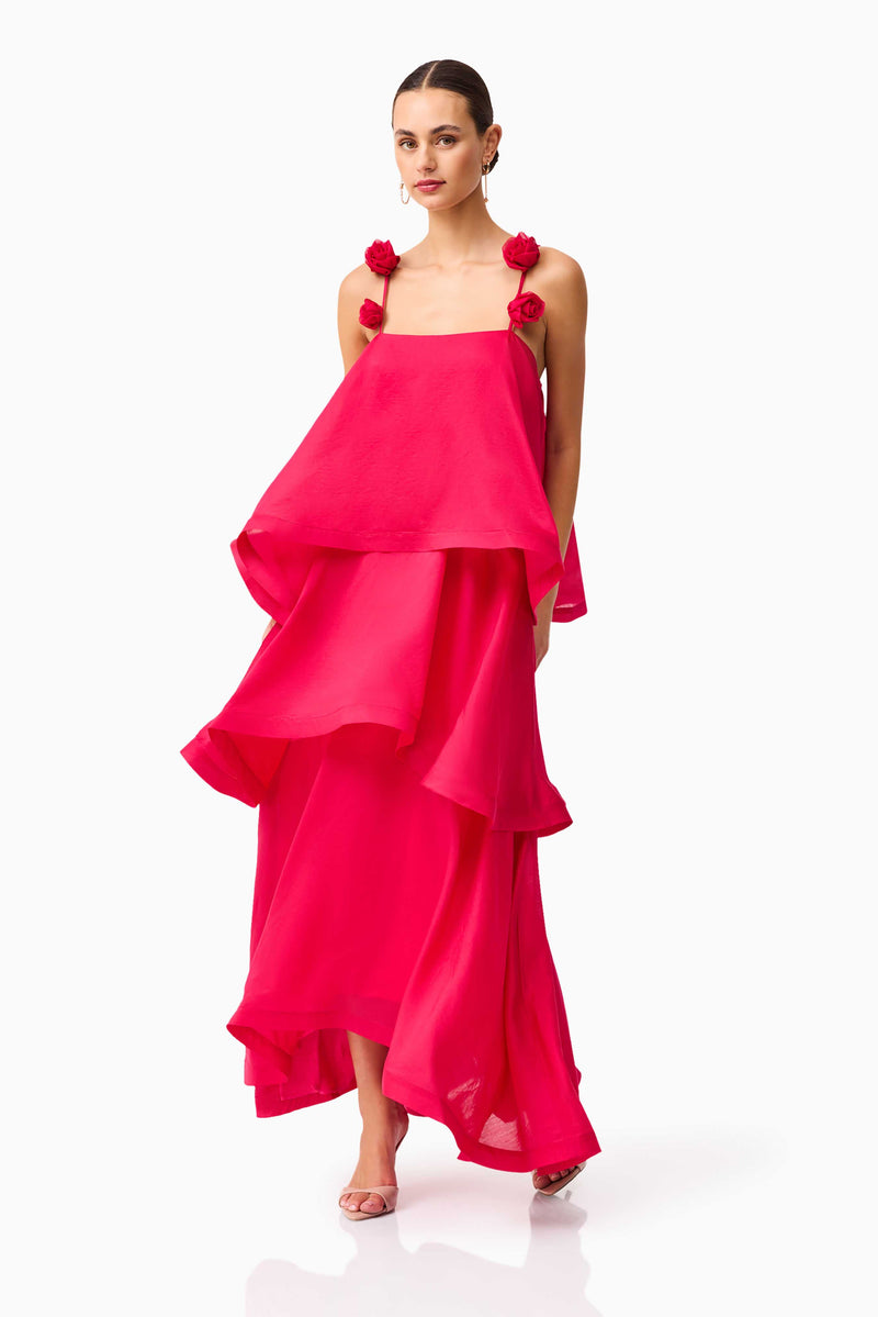Brunette model wearing the Thalia Tiered Gown in Pink posed shot