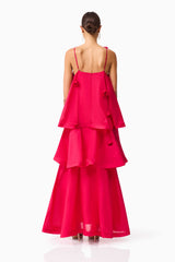 Brunette model wearing the Thalia Tiered Gown in Pink back shot