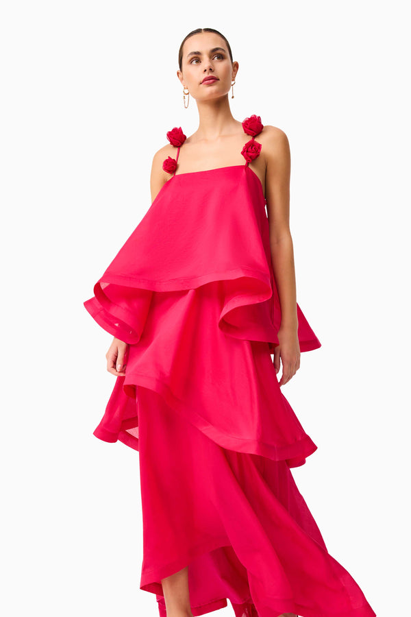 Brunette model wearing the Thalia Tiered Gown in Pink close up shot