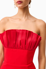 Brunette model wearing the Yasmine Strapless Mini Dress in Red detail shot 