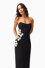 Brunette model wearing the Yasmine Strapless Maxi Dress in Black close up shot 