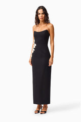 Brunette model wearing the Yasmine Strapless Maxi Dress in Black side shot 