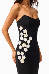 Brunette model wearing the Yasmine Strapless Maxi Dress in Black detail shot 