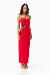 Brunette model wearing the Yasmine Strapless Maxi Dress in Red side shot 