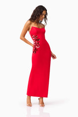 Brunette model wearing the Yasmine Strapless Maxi Dress in Red posed shot 