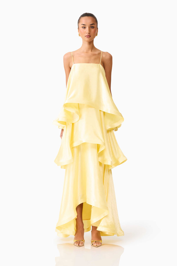 Brunette model wearing Tilly Tiered Maxi Dress in Butter Yellow front shot