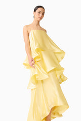 Brunette model wearing the Tilly Tiered Maxi Dress in Butter Yellow close up posed shot