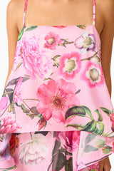 Brunette model wearing the Armani Tiered Maxi Dress in Pink Floral detail shot